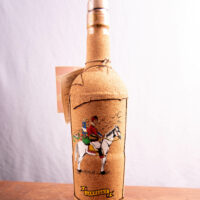 Serie di bottiglie di grappa con illustrazioni sarde - immagine 2